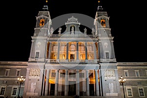 Illuminated Almudena Cathedral facade in Spanish capital Madrid