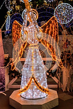 Illuminated Angel. Christmas decoration in city park