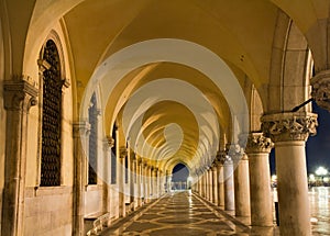 Illuminated archway of the Palazzo Ducale