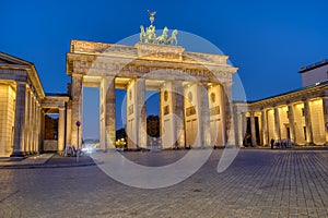 The illuminated Brandenburger Tor at dawn