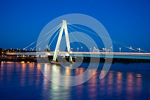 Illuminated bridge accross the river Rhein in Cologne
