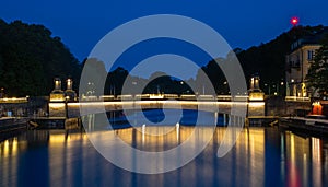 Illuminated bridge over the river Lidan in Lidkoping, Sweden