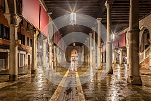 Illuminated Campo della Pescaria at night photo