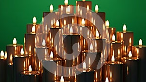 Illuminated Candles on Green Background