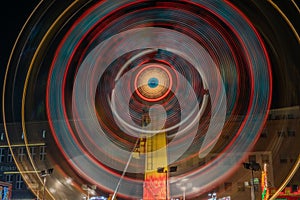 Illuminated carousel at night. photo
