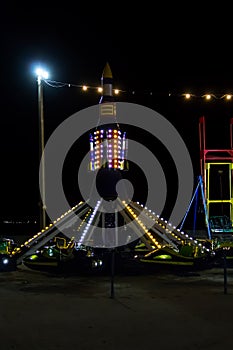 Illuminated carousel ride in amusement park