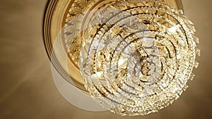 Illuminated chandelier hanging on ceiling