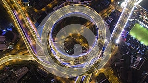 Illuminated Circular Nanpu Road Overpass at Night. Shanghai, China. Aerial Vertical Top-Down View