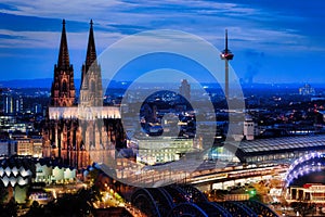 illuminated cologne cathedral and main railway station