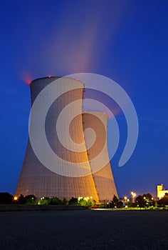 Illuminated Cooling Towers At Night