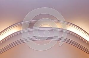 Illuminated cornice, bright interior background