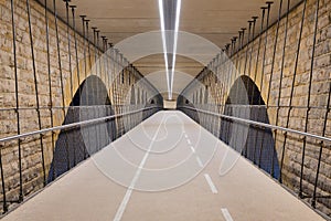 Illuminated cycle track below Pont Adolphe bridge Luxembourg city photo