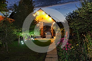 Illuminated Dacha in Twilight