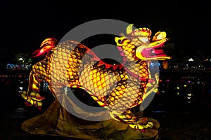 Illuminated dragon statue in Hoi An, Vietnam.