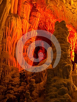 Illuminated dripstones in cave