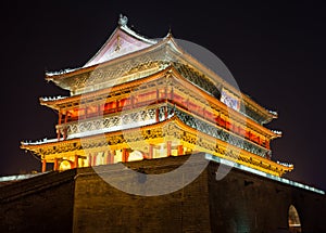 Illuminated famous ancient Bell Tower at night. China, Xian