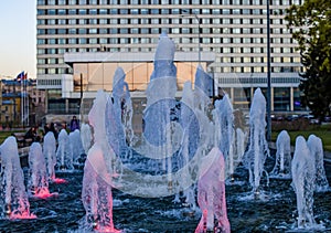 Illuminated fountain in the city