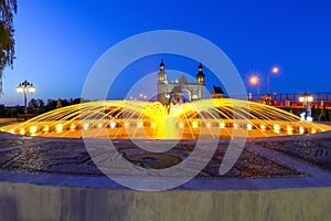 Illuminated fountain. Evening city of Sovetsk, Kaliningrad region