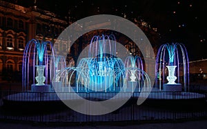 Illuminated fountain, festive decoration of the city