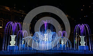 Illuminated fountain, festive decoration of the city