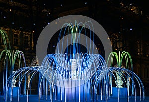 Illuminated fountain, festive decoration of the city