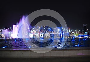 The illuminated fountain at night