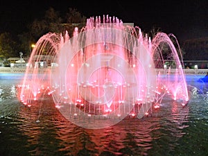 Illuminated fountain at night in Kashgar, Xinjiang, China
