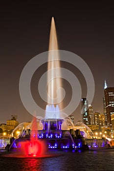Illuminated Fountain and Skyline at Night in Chicago, Illinois