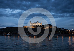 Illuminated gothic renaissance baroque medieval Bratislava castle Bratislavsky hrad fortress during blue hour