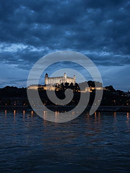 Illuminated gothic renaissance baroque medieval Bratislava castle Bratislavsky hrad fortress during blue hour