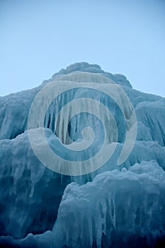 Illuminated ice castle in the winter