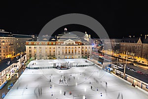 Illuminated ice skating rink in Vienna, Wien, Austria