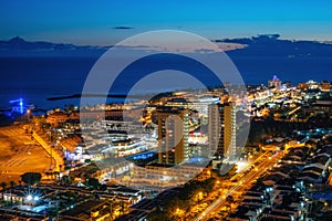 Illuminated Las Americas at night in Tenerife island, Spain