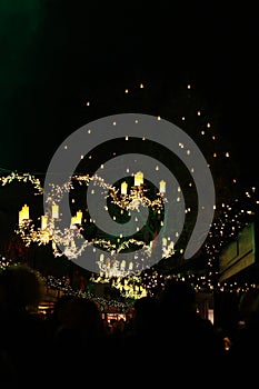 Illuminated lights above the market stalls of Cologne.