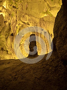 Illuminated lit lights stalagmites stalactites limestone show cave cavern Grutas da Moeda in Batalha Leiria Portugal photo