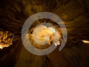 Illuminated lit lights stalagmites stalactites limestone show cave cavern Grutas da Moeda in Batalha Leiria Portugal photo