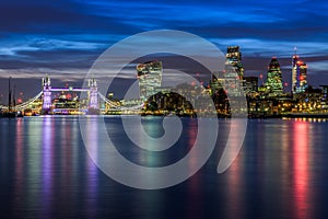 Illuminated London Cityscape During Sunset