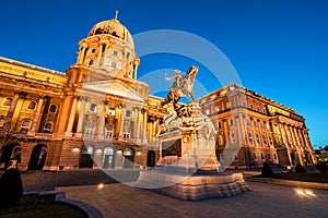 The illuminated main facade of the Buda Castle in Budapest at ni