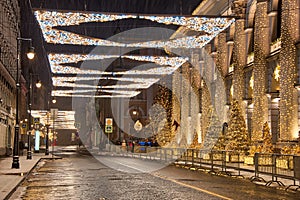 Illuminated New Year Ilinka Street in Snowfall