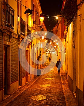 Illuminated night old street Porto