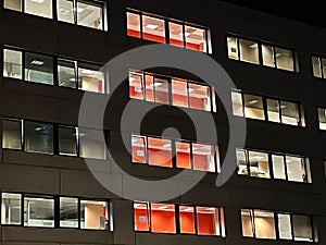 Illuminated office building at night in Madrid Las Tablas