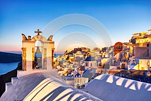 Illuminated Oia Village at Sunset on Santorini Island