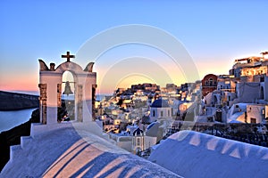 Illuminated Oia Village at Sunset on Santorini Island