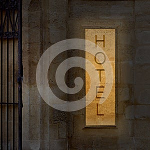 Illuminated old hotel photo