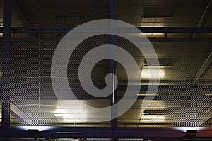 Illuminated parking garage in the night