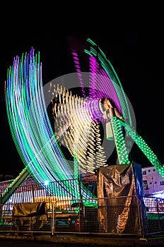 Illuminated Pendulum On Lunapark At Night