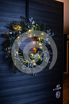 Illuminated pine and eucalyptus christmas wreath