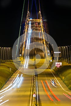 Illuminated Pont de Normandy by night, French bridge over Seine