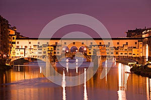 Illuminated Ponte Vecchio in Florence photo