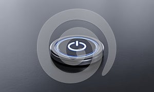 Illuminated Power Button on Dark Surface with Sleek Design